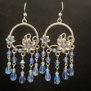 Brushed silver and iridescent light sapphire blue teardrop chandelier earrings